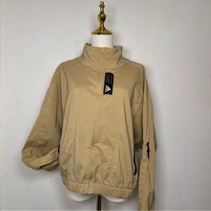 adidas track sport jacket tan beige clean girl model off duty‎ elevated basics